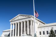 The U.S. flag flies at half-staff over the U.S. Supreme Court Building in Washington, D.C. on Feb. 26, 2016 in observance of the death of Justice Antonin Scalia, who died on Feb. 13. Photo by Phil Roeder (CC BY 2.0).