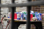 Empty beer cans cover a makeshift table in Madison on a football Saturday in 2010. Photo by Richard Hurd (CC BY 2.0)