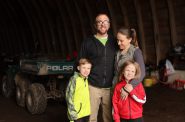 Jody and Abbie Testaberg are seen on their hemp farm, Kinni Hemp Co., along with their sons Aki, 8, and Ari, 6, in River Falls, Wis., on April 18, 2019. The Testabergs grow industrial hemp and plan to build greenhouses and indoor growing rooms. Wisconsin recently legalized growing and selling of hemp, which is from the same family as the marijuana plant. Some growers say they are producing hemp in anticipation of possible legalization of medical or recreational cannabis in Wisconsin. Photo by Emily Hamer/Wisconsin Center for Investigative Journalism.