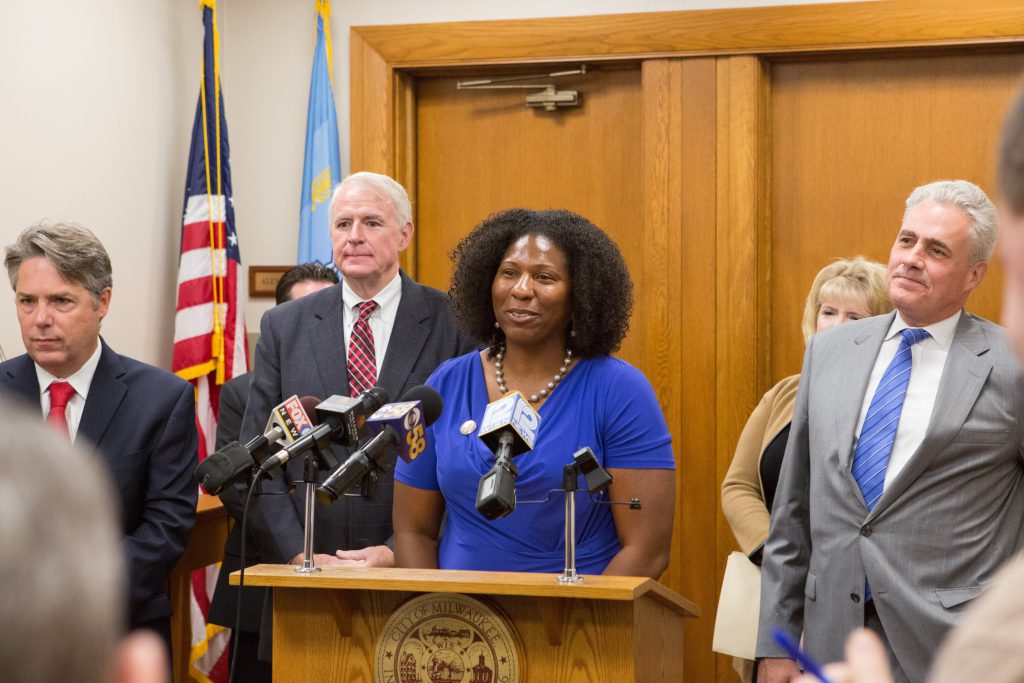 Keisha Krumm speaks at a news conference at City Hall in 2015 at which Nationstar Mortgage announced it would contribute $30.5 million to help Sherman Park homeowners recover from the foreclosure crisis. Photo courtesy of Common Ground.