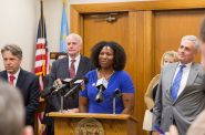 Keisha Krumm speaks at a news conference at City Hall in 2015 at which Nationstar Mortgage announced it would contribute $30.5 million to help Sherman Park homeowners recover from the foreclosure crisis. Photo courtesy of Common Ground.