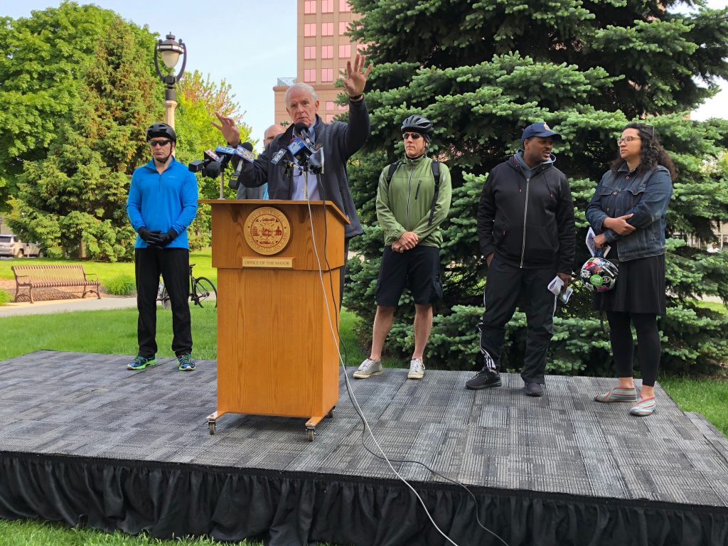 Mayor Tom Barrett with Alderman Tony Zielinski, Ald. Nik Kovac, DPW Commissioner Jeff Polenske, Ald. Ashanti Hamilton and Caressva Givens at Wisconsin Bike Week press conference. Photo by Jeramey Jannene.