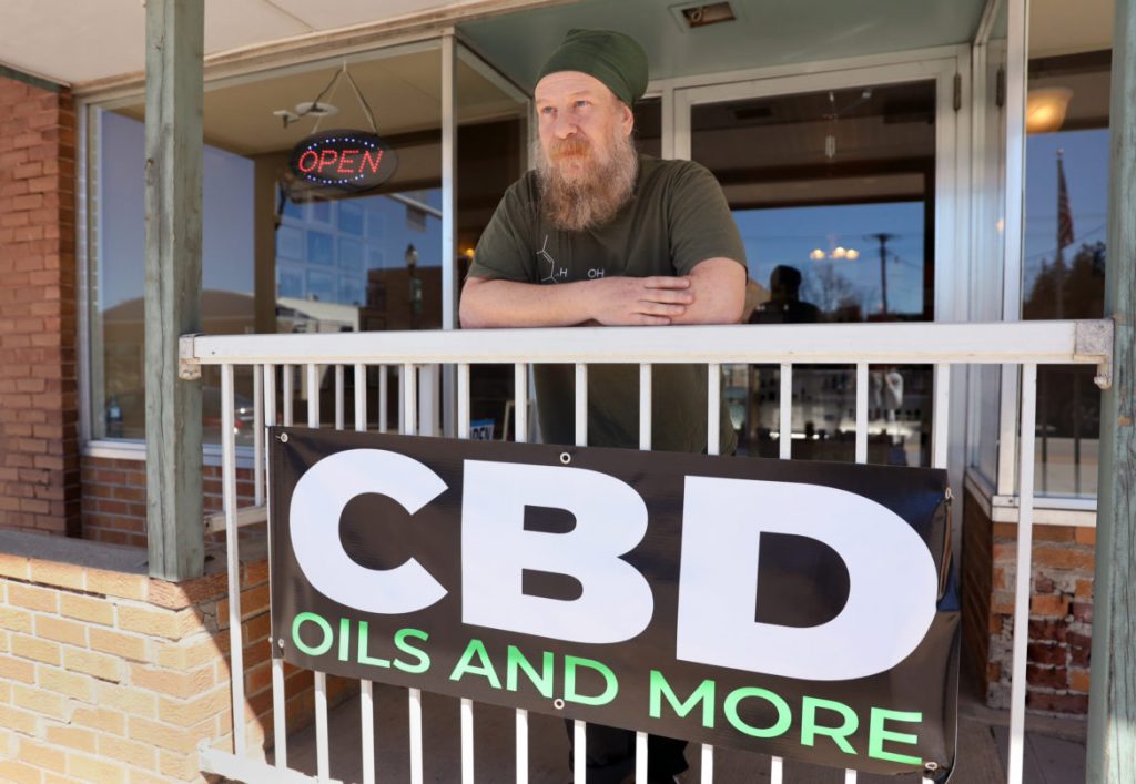 Tim Murphy owned Kickapoo Kind CBD and hemp shop in Viroqua, Wis., with his wife, Noelle Kehoe. Photo by Emily Hamer/Wisconsin Watch.