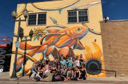 Ivan Roque's goldfish and sunflower mural was painted on the Tosa Yoga building, 6734 W. North Ave. Photo courtesy of Wallpapered City.