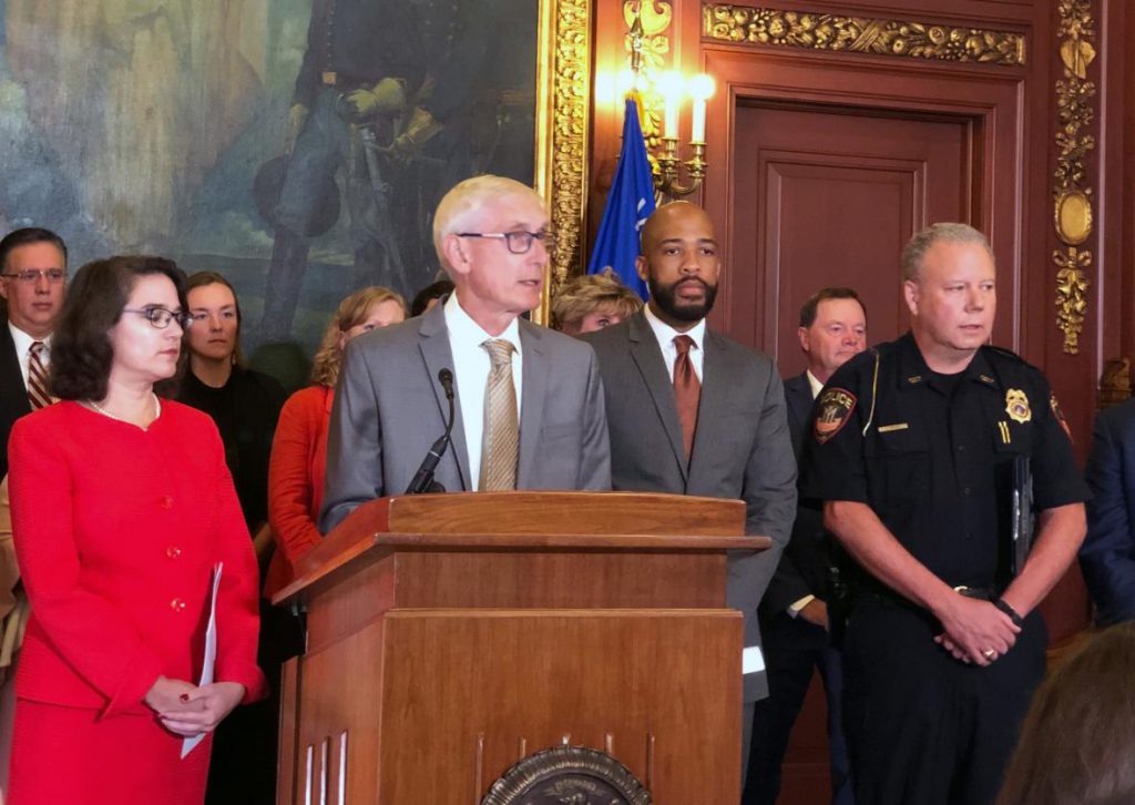 Gov. Tony Evers speaks at a Capitol press conference announcing legislation for universal background checks for firearm sales on Thursday, Aug. 15, 2019. Photo by Laurel White/WPR.