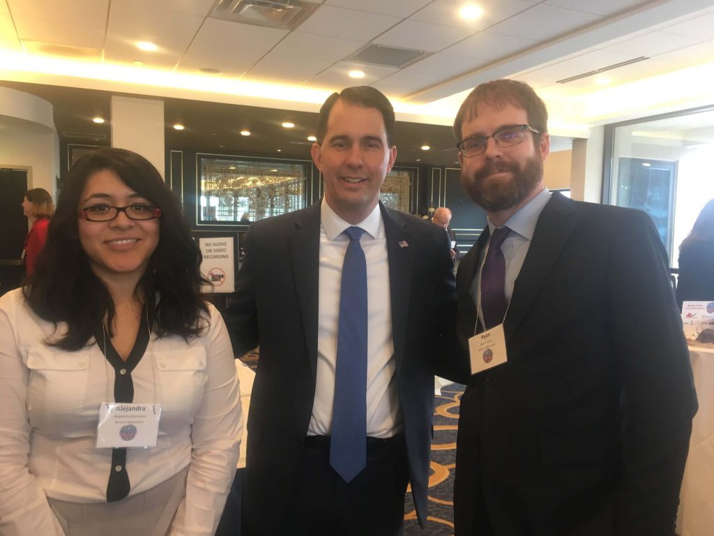 Ryan Clancy, right, with Gov. Scott Walker and Alejandra Gonzalez Aviña, left, at the time a manager for Clancy's business, during a Wisconsin Restaurant Association lobbying day in January 2018. Photo courtesy of Ryan Clancy.