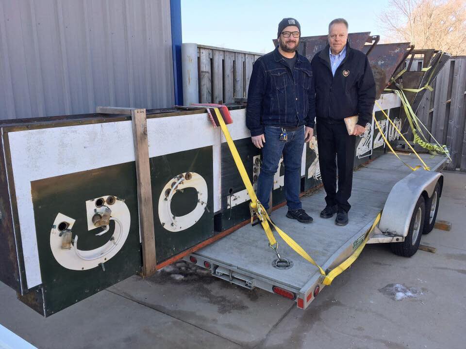 Adam Levin and Jim Witkowiak pose with the Goldmann's sign. Photo from Adam Levin.