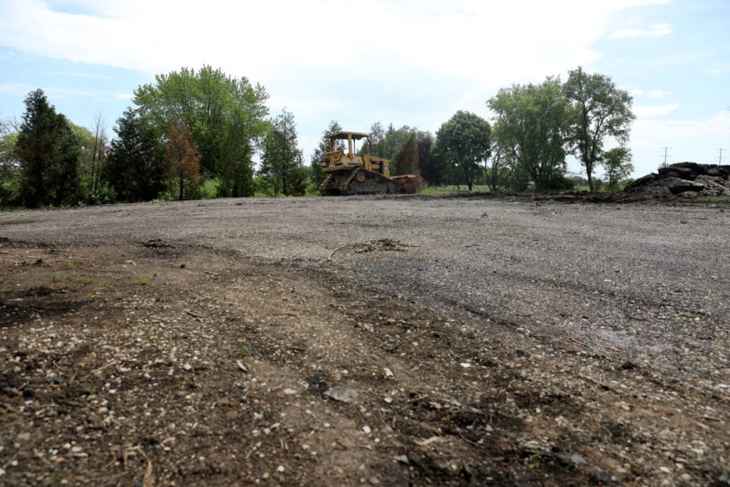 The former home of the Mueller family at 9725 Braun Road in Sturtevant, Wis., is now an empty dirt lot. Their house was demolished to make way for road improvements for the Foxconn project. Wisconsin Public Radio learned the road widening was scuttled even before the Muellers were told they needed to move. Photo taken July 1, 2019. Photo by Coburn Dukehart / Wisconsin Watch.