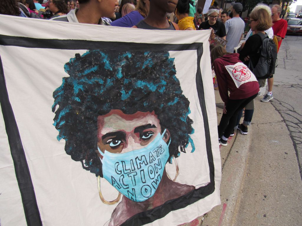 Banner at Milwaukee climate march 2019. Photo by Isiah Holmes/Wisconsin Examiner.