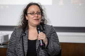 “The justice system is meant to serve everyone — it does serve everyone — and it needs to be funded equitably, not on the backs of people going through it,” says Joanna Weiss, co-director of the Fines and Fees Justice Center in New York. She was photographed in March 2019, at John Jay College of Criminal Justice in New York City. Photo courtesy of David Greenwald.