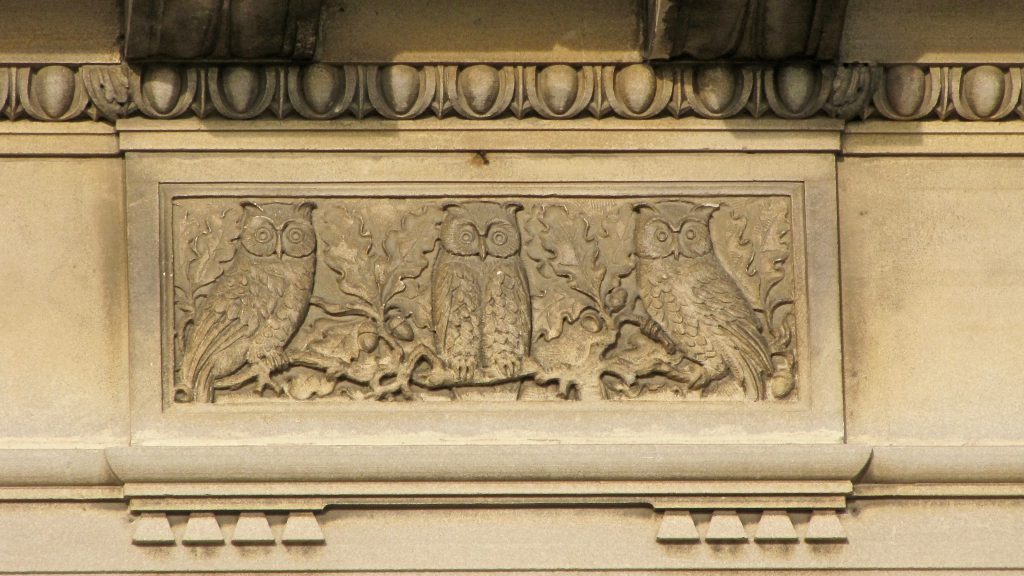 Three owls decorate the entry, a reminder of a long-gone secret society. Carl Swanson photo.