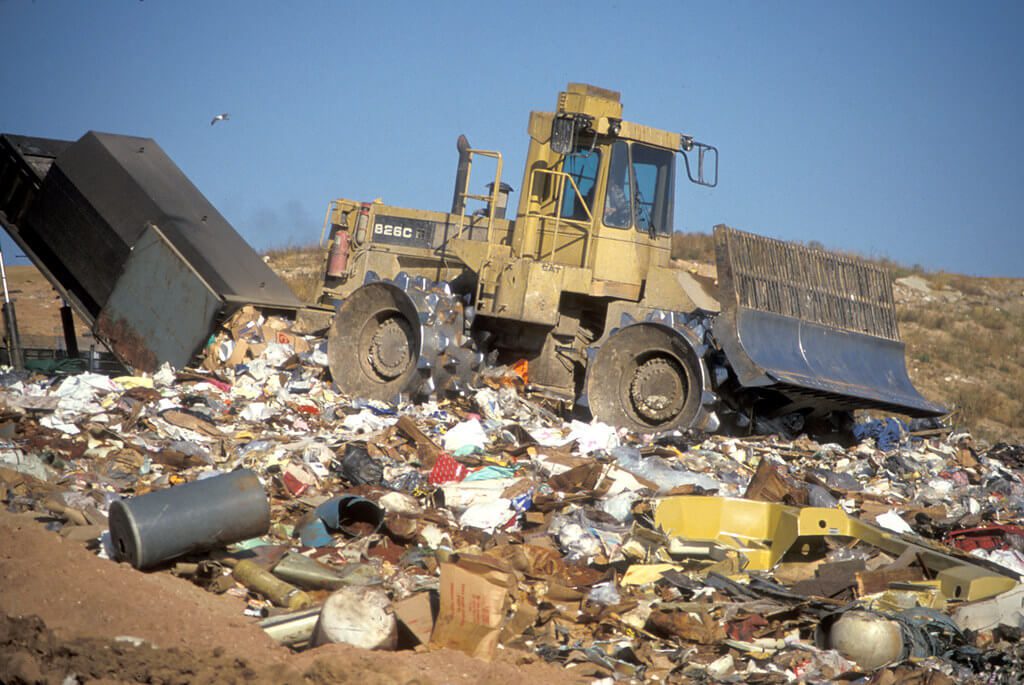 Bulldozer spreads garbage at a landfill. Photo from the Wisconsin Department of Natural Resources.