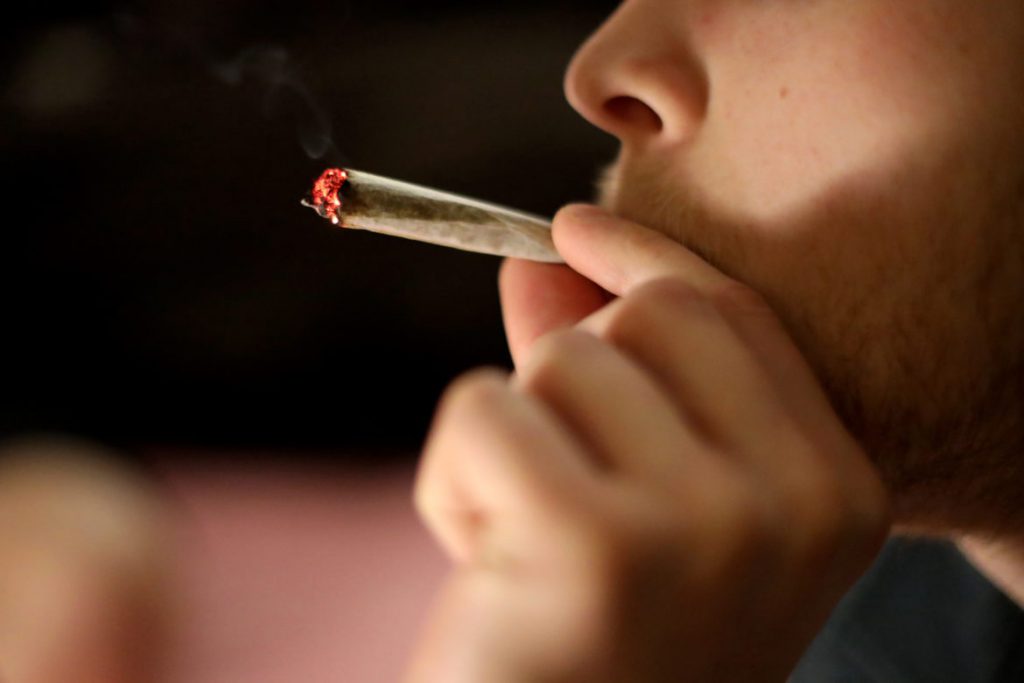 A resident of Wisconsin smokes a joint. Photo by Emily Hamer/Wisconsin Watch.