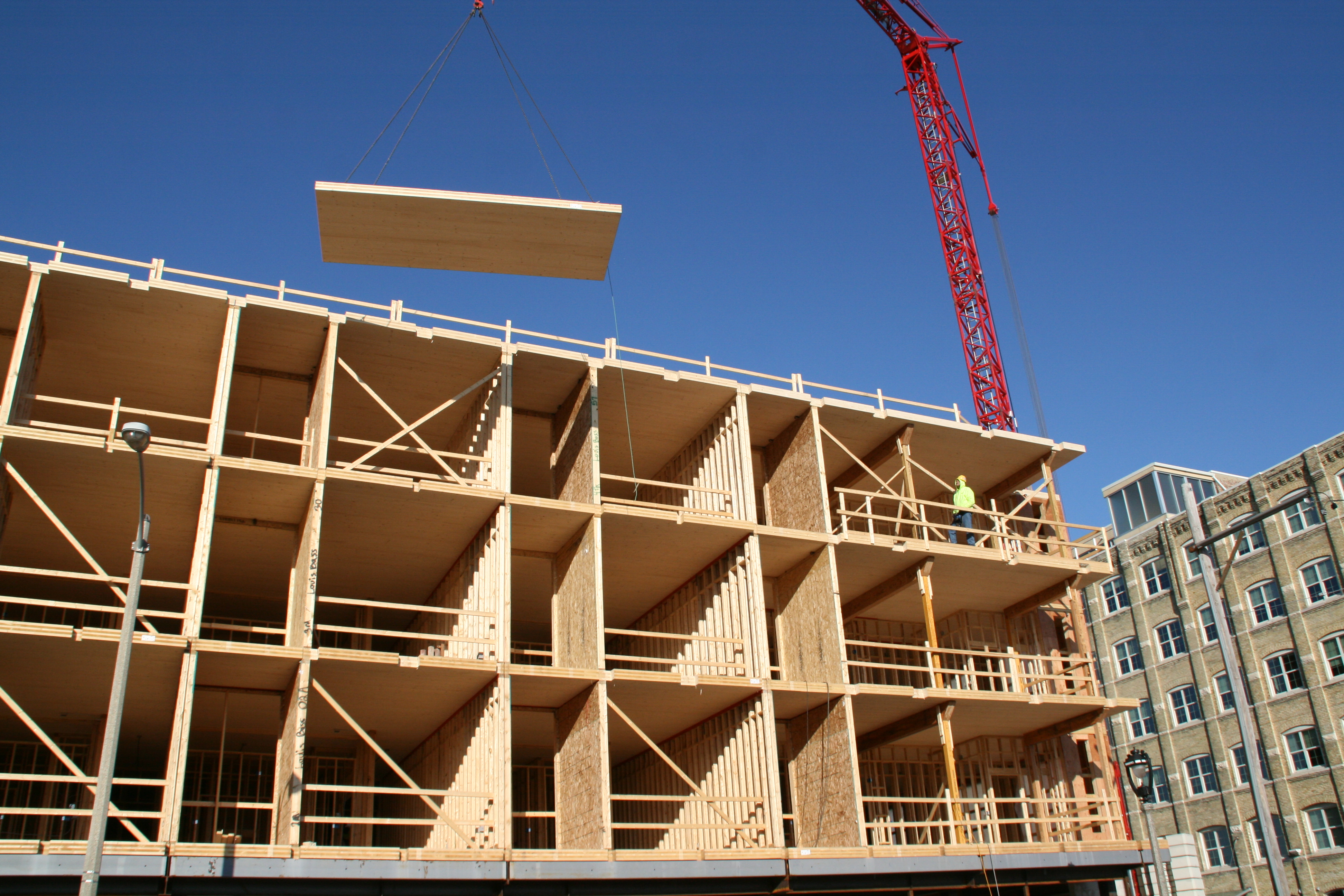 Eyes On Milwaukee City s First Mass Timber Building Tops Off Urban 