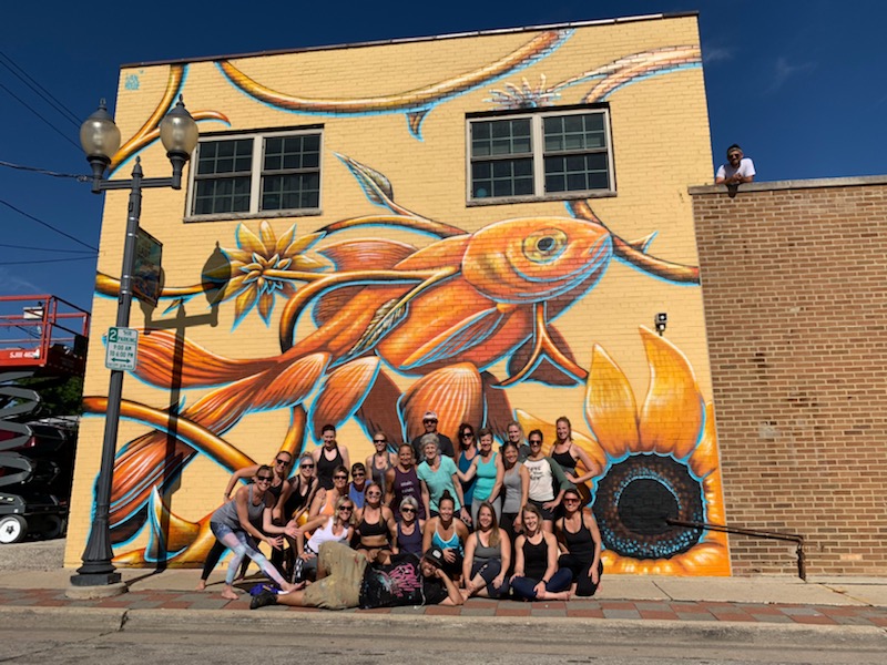 Ivan Roque's goldfish and sunflower mural is one of six murals displayed on North Avenue in Wauwatosa. Photo courtesy of Wallpapered City.