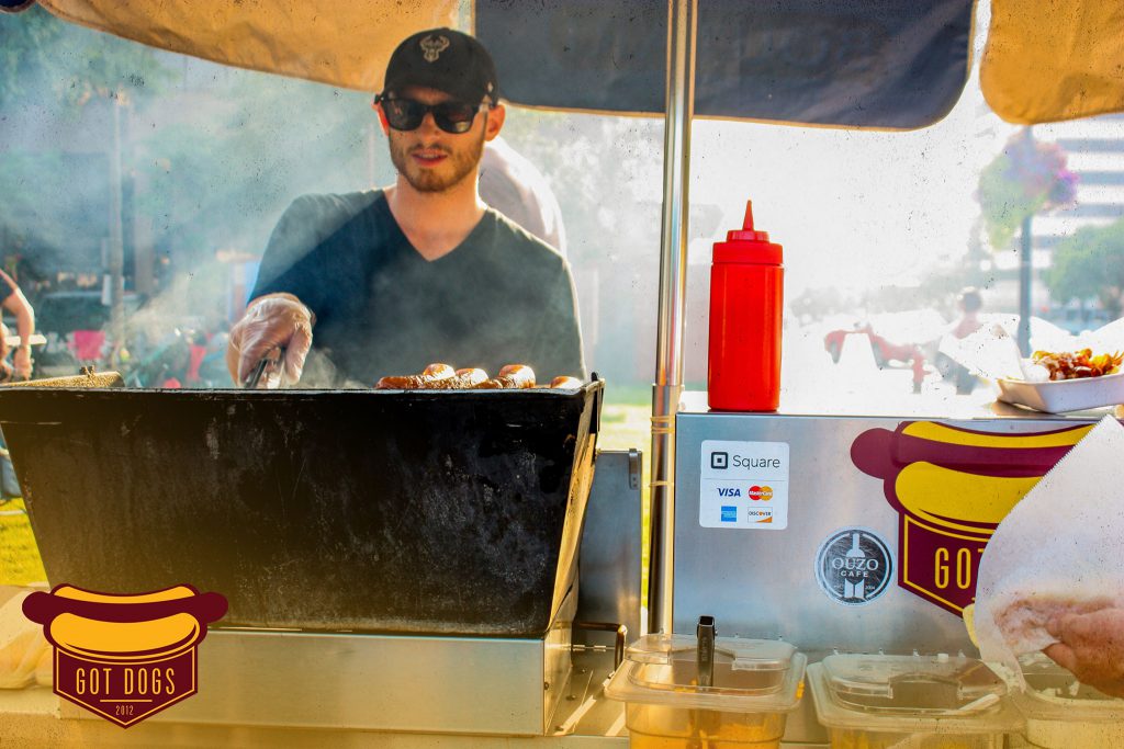 Tom Pappas behind the grill. Photo from Got Dogs.