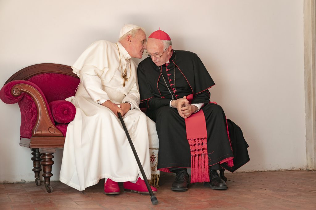 Anthony Hopkins and Jonathan Pryce in 'The Two Popes.' Photo by Peter Mountain.
