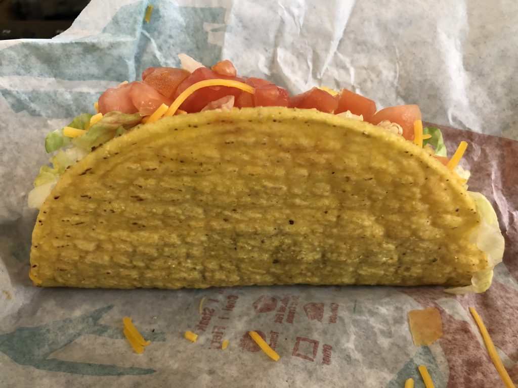 A Crunchy Taco Supreme from Taco Bell. Photo by Famartin [CC BY-SA (https://creativecommons.org/licenses/by-sa/4.0)].