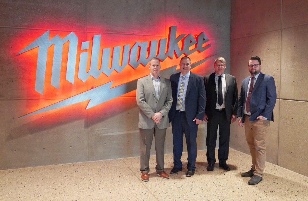 Milwaukee Tool CFO Ty Staviski with City of West Bend Administrator Jay Shambeau, Development Director Mark Piotrowicz, and Economic Development Manager Adam Gitter at Milwaukee Tool’s Global Headquarters in Brookfield. Photo courtesy of the City of West Bend.