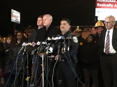 Milwaukee Police Chief Alfonso Morales spoke at a Wednesday evening news conference about the shooting. Milwaukee Mayor Tom Barrett, pictured left, and Gov. Tony Evers, pictured right, also spoke about the shooting. Photo by Corrinne Hess/WPR.