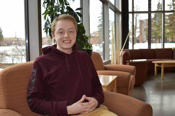 UW-Superior sophomore Jared Pearson is backing Joe Biden because he thinks the former vice president can bridge the divide among Americans. Photo by Danielle Kaeding/WPR.