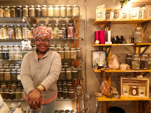 Angela Mallett opened her store, HoneyBee Sage Wellness, at Sherman Phoenix in November 2018 in Milwaukee. At a Jan. 14, 2020 visit to her store, she said she loves the sense of community at the business incubator. Photo by Corrinne Hess/WPR.