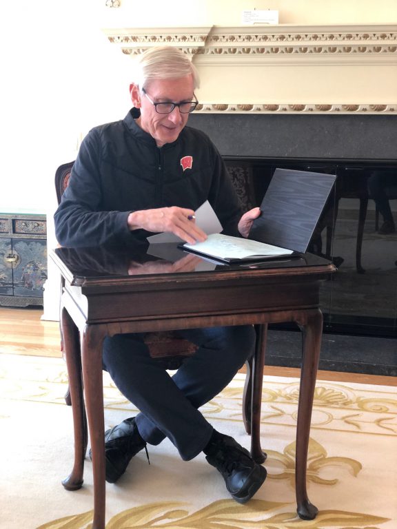 Gov. Evers signing Assembly Bill 1038, now 2019 Wisconsin Act 185. Photo courtesy of the Governor's office.