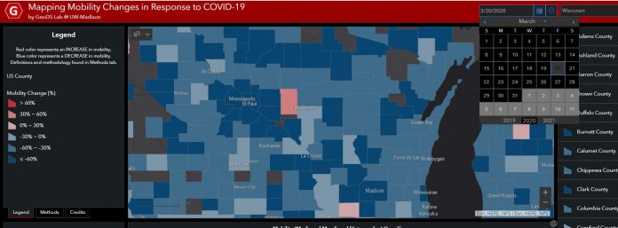 This map shows changes in mobility county by county in Wisconsin on March 20. The red and pink areas indicate greater movement on that date compared with the baseline in late February. Screenshot from Mapping Mobility Changes in Response to COVID-19 by GeoDS Lab @ UW-Madison.