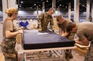 Hospital bed being setup in McCormick Place. U.S. Air Force Photo by Senior Airman Jay Grabiec
