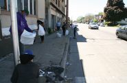 Milwaukeeans clean up the streets. Photo by Jeramey Jannene.