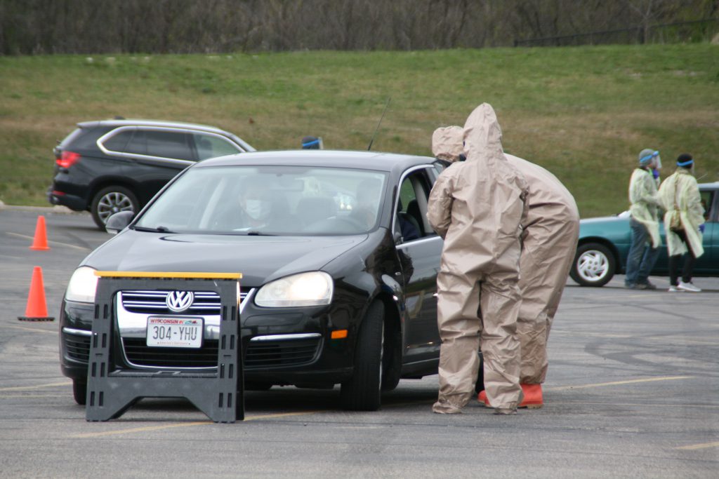 Wisconsin National Guard individuals man a COVID-19 testing facility. File photo by Jeramey Jannene.