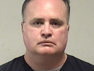 Salem Man, an Illinois Police Officer, Arrested and Charged with Possession of Child Pornography