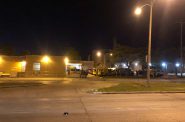 Members of the Wisconsin National Guard protect the Milwaukee Police Department's District Five Station. Photo by Jeramey Jannene.