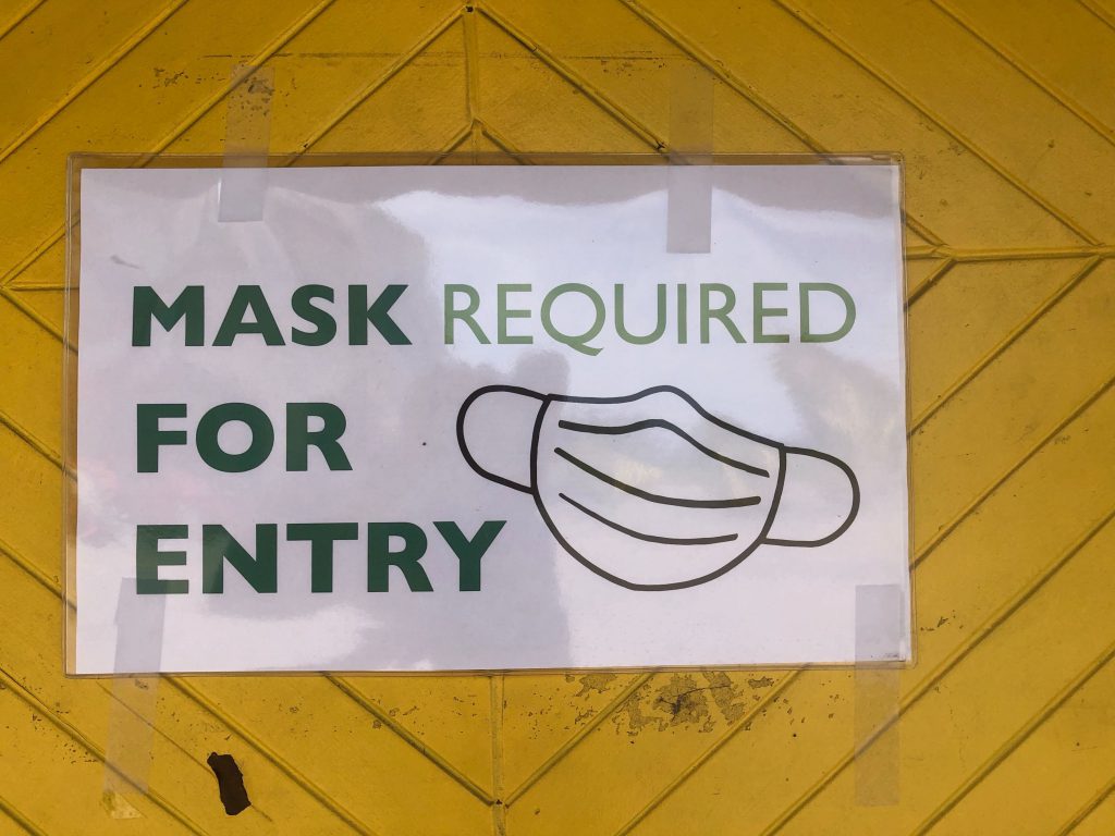 Mask requirement sign at Allie Boy's Bagels. Photo by Jeramey Jannene.