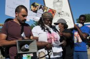 Tracy Cole, Alvin's mother, speaks to the marchers. Photo by Isiah Holmes/Wisconsin Examiner.