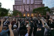 Protesters gather at Red Arrow Park. Photo by Graham Kilmer.