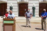 Assembly Majority Leader Jim Steineke (R-Kaukauna) speaks to reporters at a press conference in front of the state Capitol on Wednesday, Behind him from left are Rep. Barb Dittrich (R-Oconomowoc), Speaker Pro Tempore Tyler August (R-Lake Geneva) and Rep. Jon Plumer (R-Lodi). Photo by Erik Gunn/Wisconsin Examiner.