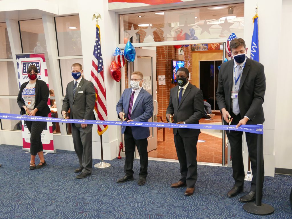 Ribbon cutting for USO Lounge and Mitchell Gallery of Flight. Photo by Grahm Kilmer.