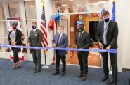 Ribbon cutting for USO Lounge and Mitchell Gallery of Flight. Photo by Grahm Kilmer.