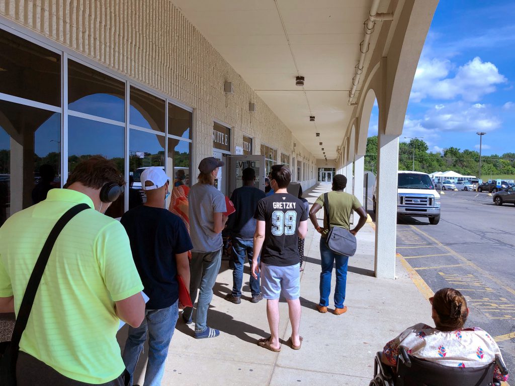 Line of people waiting to enter the DMV at 2701 S. Chase Ave. during the COVID-19 pandemic. File photo by Dave Reid.