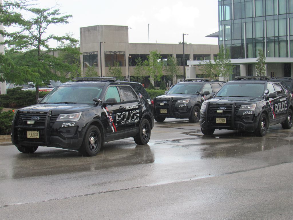 Wauwatosa Police Department squad cars responding during a standoff with protesters on July 7, 2020. Photo by Isiah Holmes/Wisconsin Examiner.