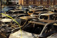 Burned out vehicles in Kenosha. Photo by Henry Redman/Wisconsin Examiner.