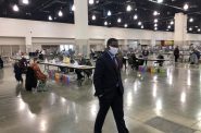 Milwaukee County Executive David Crowley visits the the convention center on the fourth day of the recount. Photo by Jeramey Jannene.