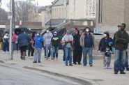 Voters wait in line to vote at Washington High School on April 7. Photo by Isiah Holmes/Wisconsin Examiner.