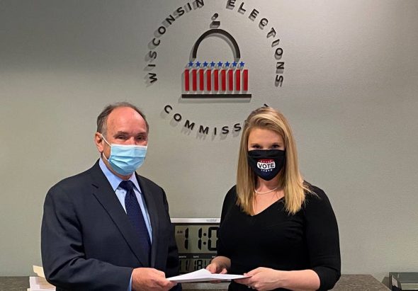 Attorney James Troupis presenting the recount petition to Meagan Wolfe. Photo from the WEC.