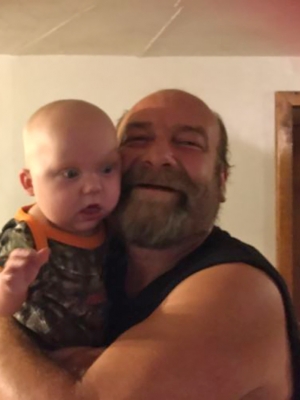 Thomas Benser with his nephew in 2017. Benser was recently hospitalized after contracting COVID-19 at the Oshkosh Correctional Institution. Photo courtesy of Traci McMorran