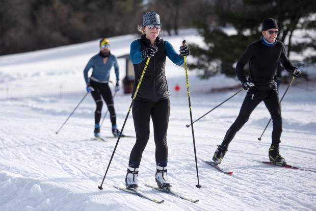 People cross-country ski on Monday, Dec. 21, 2020, at Elver Park in Madison, Wis. Angela Major/WPR