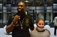 Damari Gholson Perkins, shown with executive director Lance Ambrose, says he enjoys being a part of the Saving Our Sons program. Photo by Ana Martinez-Ortiz/NNS.