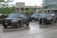 Wauwatosa Police Department squad cars responding during a standoff with protesters on July 7, 2020. Photo by Isiah Holmes/Wisconsin Examiner.