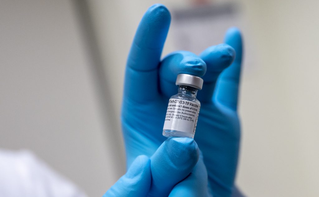 Pfizer-BioNTech COVID-19 vaccine. photo by Lisa Ferdinando. U.S. Secretary of Defense, CC BY 2.0 , via Wikimedia Commons